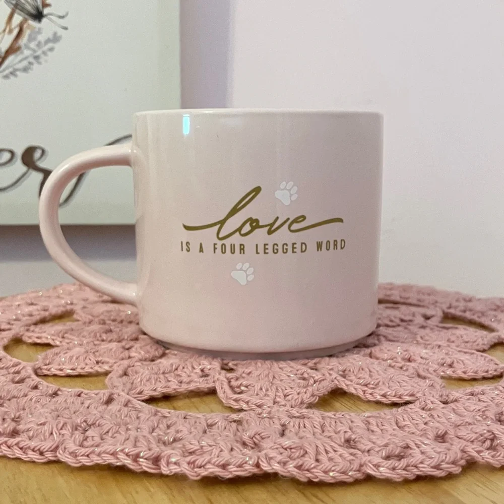 Pretty Pink Mug reads “love is a four legged word”!